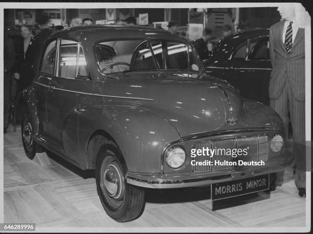 Front view of a Morris Minor automobile at the largest Motor Show yet at Earls Court.