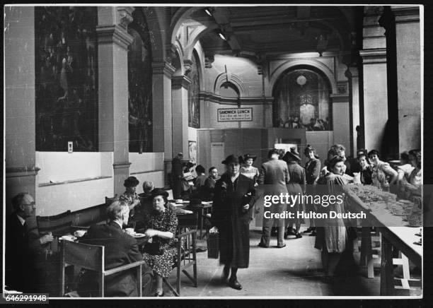 Scene inside the British museum where the hall has been adapted as a restaurant for the public and staff during the Second World War.