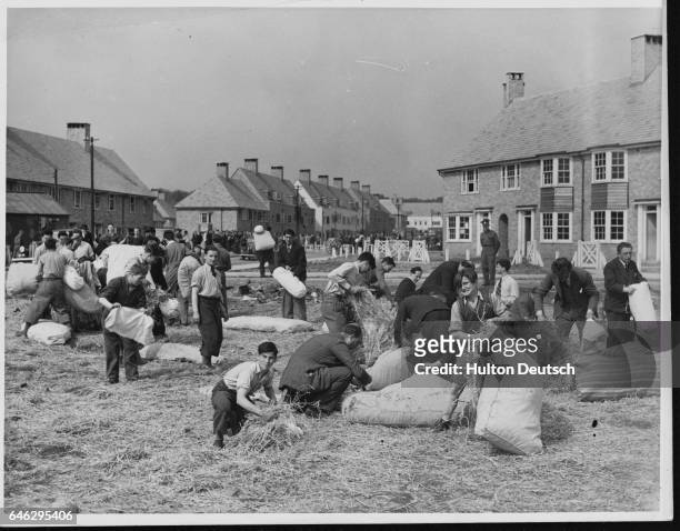 People specified by the government to be aliens are currently interned on a housing estate in Huyton, Liverpool. The inhabitants of the camp stuff...