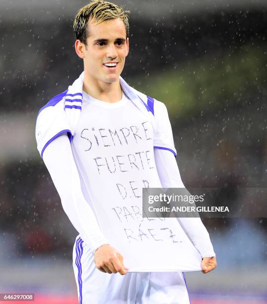 Real Sociedad's forward Juanmi Jimenez celebrates after scoring his team's first goal during the Spanish league football match Real Sociedad vs SD...