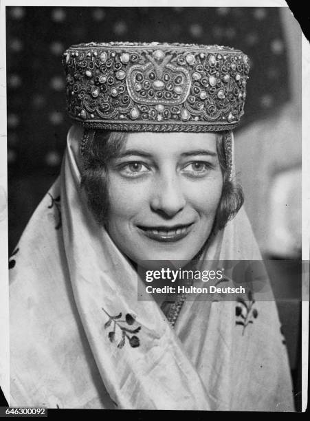 American society debutante, Janet McLeay, wearing a 100,000 dollar crown after winning the title of Miss Oriental, ca. 1935.