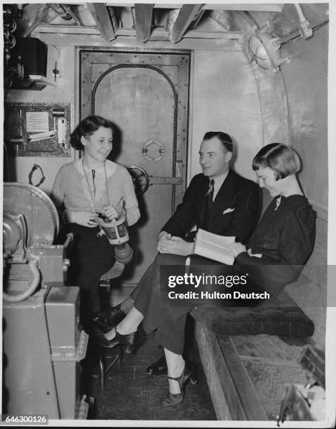 Workers in a gas and bomb proof office in London, ca. 1940.