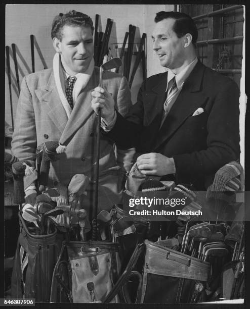 The golfers, Harry Weetman and Max Faulkner, choosing golf clubs to take with them to a three day international tournament in Miami, 1952 | Location:...