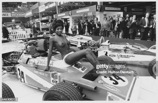 Topless model at the 1971 Earls Court Motor Show.