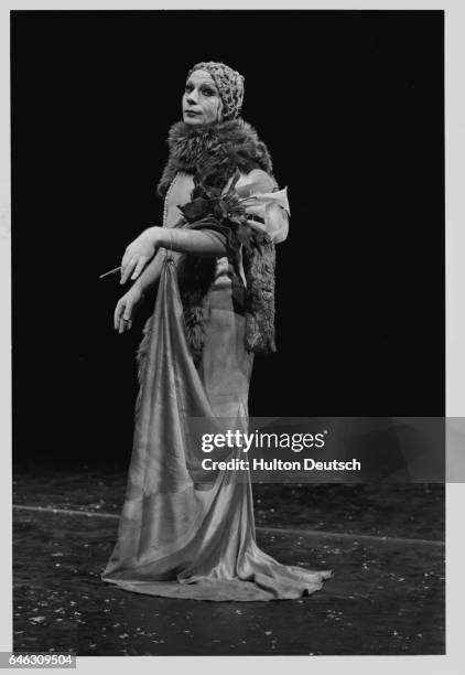 Lindsay Kemp, the Scottish mime artist and dancer, dons a gown and feather boa for his starring role in Flowers.