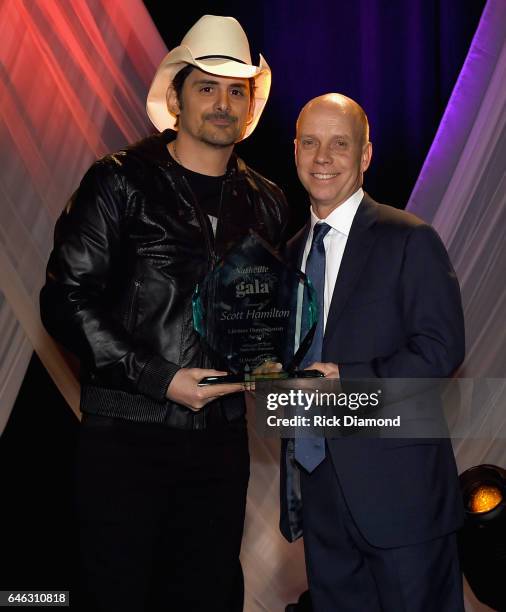 Brad Paisley present Scott Hamilton with the Lifetime Humanitarian Award at the T.J. Martell Foundation 9th Annual Nashville Honors Gala at Omni...