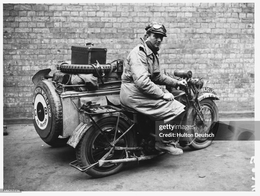 Mr. S.T Granfield Sitting on Motorcycle