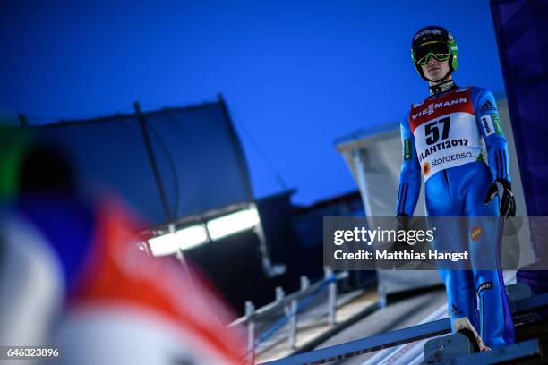 Jurij Tepes of Slovenia prepares for his jump during the Men's LH134 Ski Jumping Training during the FIS Nordic World Ski Championships on February...
