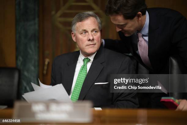 Senate Select Intelligence Committee Chairman Richard Burr listens to committee staff before former U.S. Senator Dan Coats' confirmation hearing to...