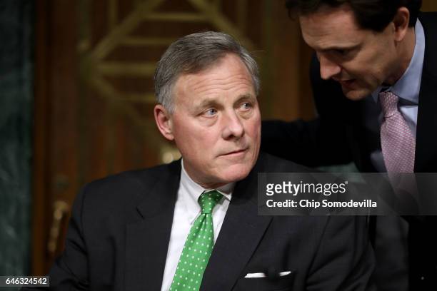 Senate Select Intelligence Committee Chairman Richard Burr listens to committee staff before former U.S. Senator Dan Coats' confirmation hearing to...