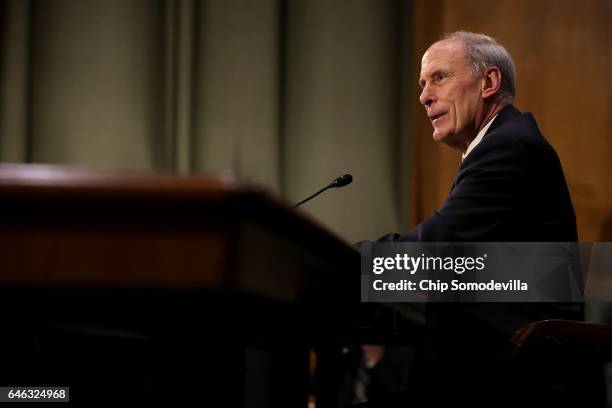 Former U.S. Senator Dan Coats testifies during his confirmation hearing before the Senate Select Intelligence Committee to be the next Director of...