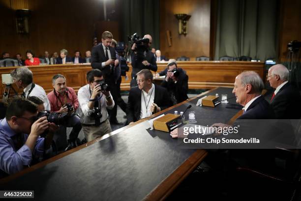 Former U.S. Senator Dan Coats is joined by Sen. Saxby Chambliss before Coats' confirmation hearing to be the next Director of National Intelligence...
