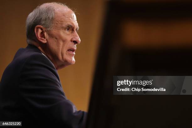 Former U.S. Senator Dan Coats testifies during his confirmation hearing before the Senate Select Intelligence Committee to be the next Director of...