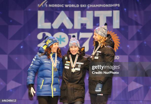 Charlotte Kalla , Marit Bjoergen , Astrid Uhrenholdt Jacobsen , during the Award Ceremony after Ladies cross-country 10.0km Individual Classic final,...