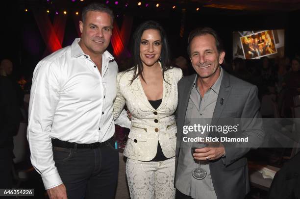 Troy Gentry Montgomentry Gentry, Singer/Songwriter Krista Maria and B&R mananger Marc Oswald attend the T.J. Martell Foundation 9th Annual Nashville...
