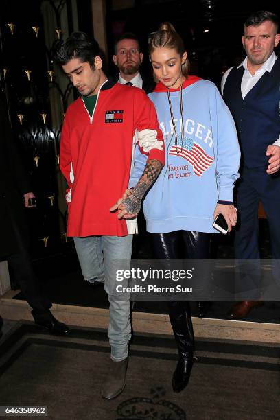 Gigi Hadid and Zayne Malik leave their hotel on February 28, 2017 in Paris, France.