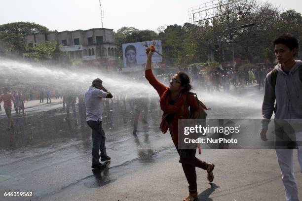 Police use water cannon on demonstrators during the shutdown against gas tariff hike in Dhaka, Bangladesh on February 28, 2017. Activists from the...