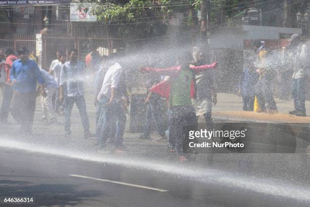 Police use water cannon on demonstrators during the shutdown against gas tariff hike in Dhaka, Bangladesh on February 28, 2017. Activists from the...
