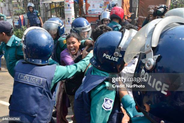 Police arrest demonstrators during the shutdown against gas tariff hike in Dhaka, Bangladesh on February 28, 2017. Activists from the...