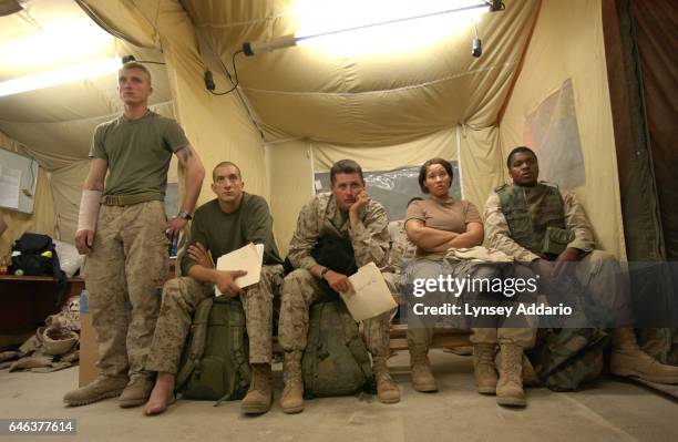 Staff at Balad Air Force Base, Iraq, on November 15, 2004. Hundreds of wounded soldiers have come through the military hospital for emergency...