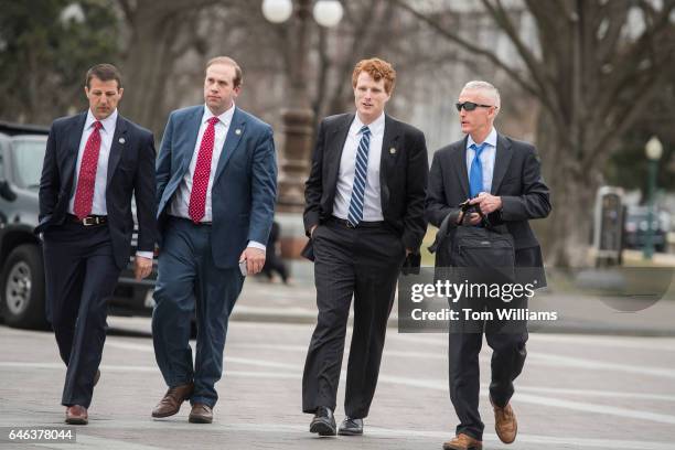 From left, Reps. Markwayne Mullin, R-Okla., Jason Smith, R-Mo., Joe Kennedy, D-Mass., and Trey Gowdy, R-S.C., make their way to a vote in the Capitol...