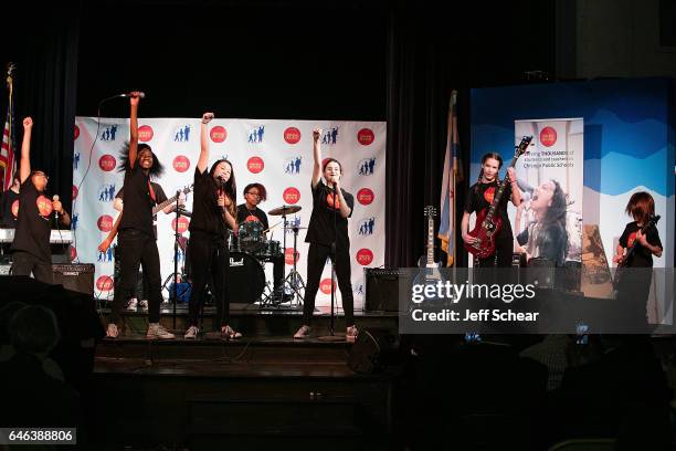Students perform at Chicago Public School Announces Music Program Expansion With Little Kids Rock at Franklin Fine Arts Center Auditorium on February...