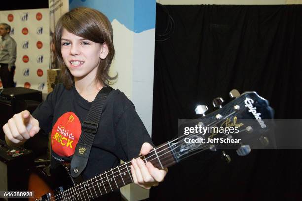 Student attends as Chicago Public School Announces Music Program Expansion With Little Kids Rock at Franklin Fine Arts Center Auditorium on February...