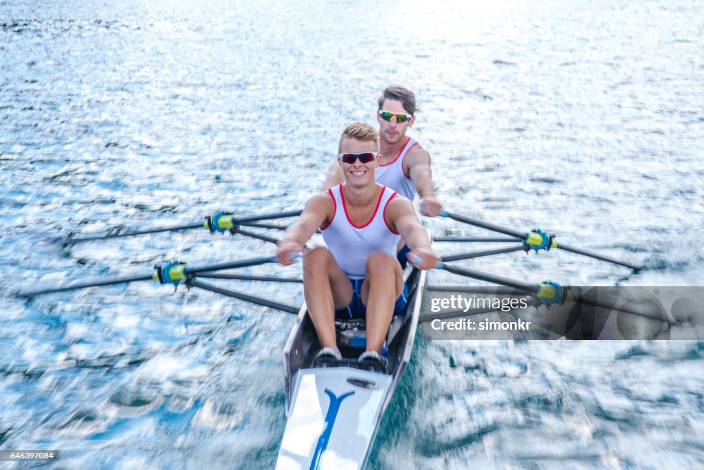 Men rowing boat