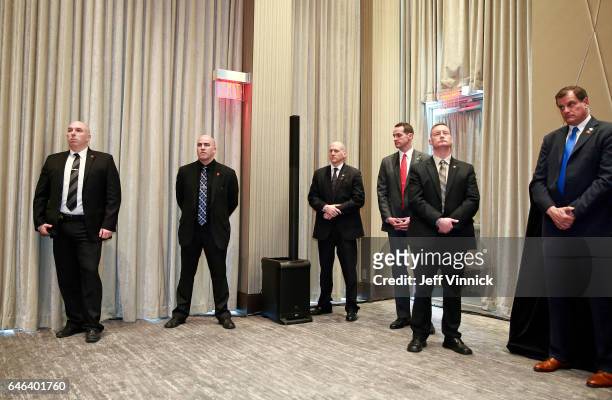 Security personal look on during the ceremony for the official opening of the Trump International Tower and Hotel on February 28, 2017 in Vancouver,...