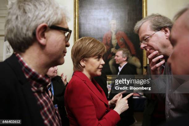 Nicola Sturgeon, Scotland's first minister and leader of the Scottish National Party , center, speaks with delegates after a speech at a David Hume...