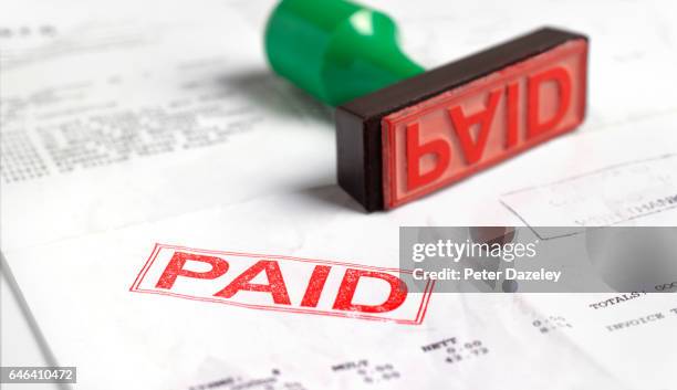 paid invoice - english letters on white background bildbanksfoton och bilder