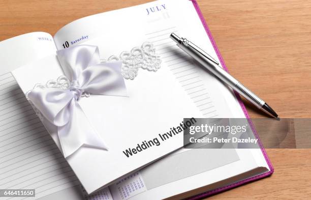 wedding invitation and diary - wedding invitation fotografías e imágenes de stock