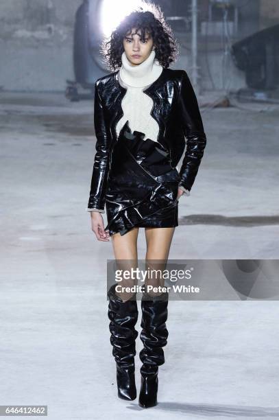 Fernanda Oliveira walks the runway during the Saint Laurent show as part of the Paris Fashion Week Womenswear Fall/Winter 2017/2018 on February 28,...