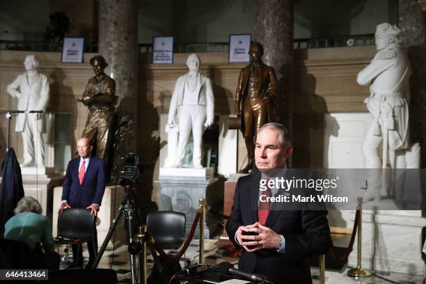 Commerce Secretary Wilbur Ross , and EPA Administrator Scott Pruitt prepare to do television interviews in Statuary Hall at the U.S. Capitol before...