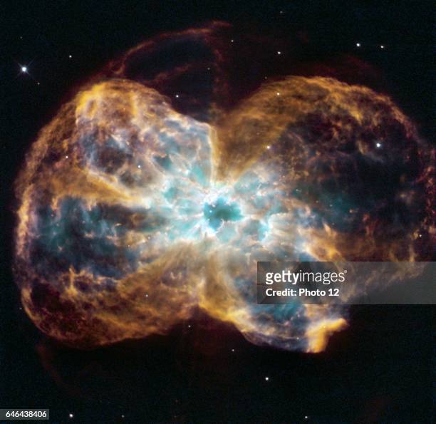 The star is ending its life by casting off its outer layers of gas, which formed a cocoon around the star's remaining core. Ultraviolet light from...