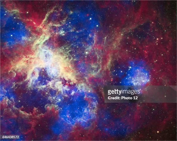 This composite of 30 Doradus, aka the Tarantula Nebula, contains data from Chandra, Hubble, and Spitzer. Located in the Large Magellanic Cloud, the...