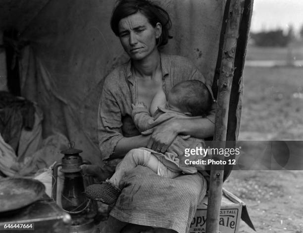 Migrant agricultural worker's family. Seven children without food. Mother aged thirty-two. Father is a native Californian. Nipomo, California 1936 ....