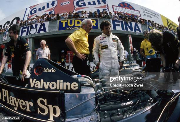 Formel 1, Grand Prix Italien 1978, Monza, Boxengasse, Lotus-Box Mario Andretti Colin Chapman, Lotus Lotus-Ford 79 Lotus-Mechaniker www.hoch-zwei.net...