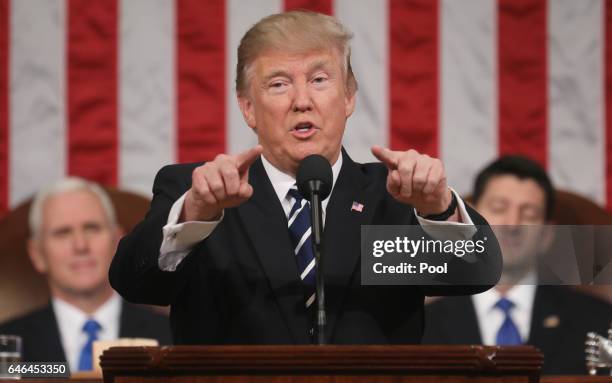 President Donald J. Trump delivers his first address to a joint session of the U.S. Congress as U.S. Vice President Mike Pence and Speaker of the...