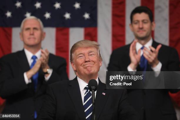 President Donald J. Trump delivers his first address to a joint session of the U.S. Congress as U.S. Vice President Mike Pence and Speaker of the...