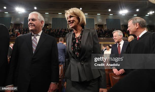 Secretary of State Rex Tillerson and Secretary of Education Betsy DeVos arrive for US President Donald J. Trump's first address to a joint session of...