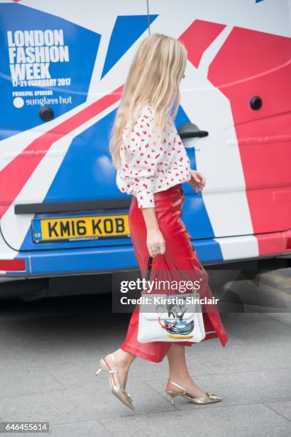 Fashion stylist Kate Foley Osterweis wears a JW Anderson, AWAKE skirt Frances Valentine shoes bag on day 2 of London Womens Fashion Week...