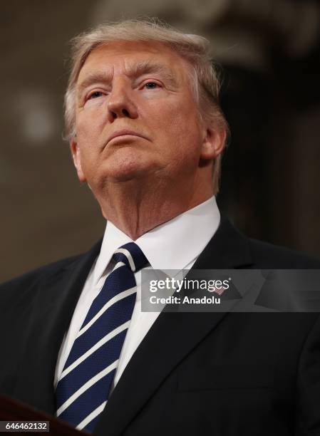 President Donald J. Trump delivers his first address to a joint session of Congress from the floor of the House of Representatives in Washington,...