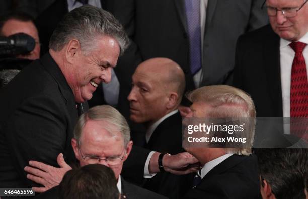 President Donald Trump talks with Rep. Peter King after addressing a joint session of the U.S. Congress on February 28, 2017 in the House chamber of...