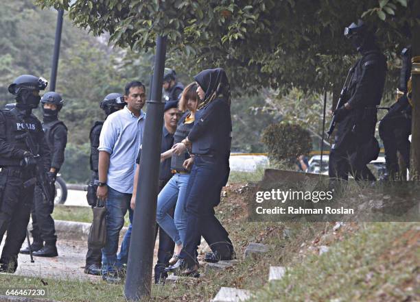 Doan Thi Huong, one of the suspect leaves under heavy security presence at Sepang Magistrate Court on March 1, 2017 in Sepang, Selangor. Kim...