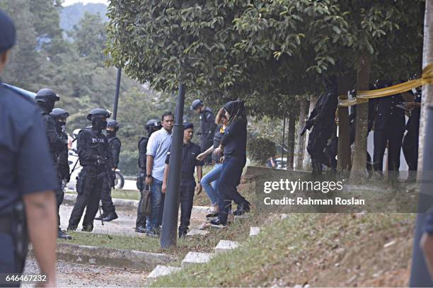 Doan Thi Huong, one of the suspect leaves under heavy security presence at Sepang Magistrate Court on March 1, 2017 in Sepang, Selangor. Kim...