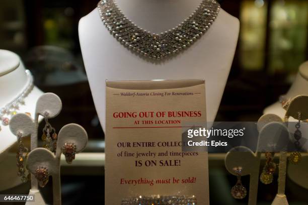 Sign in the display case of a jewelry store inside the Waldorf Astoria hotel, Manhattan New York, letting customers know of the closing down sale,...
