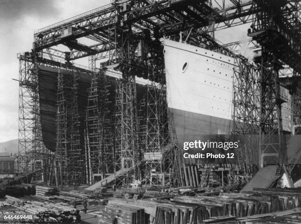 The White Star Line vessels Olympic and Titanic under construction in Harland and Wolff's shipyard, Belfast, Northern Ireland, 1909-1911.