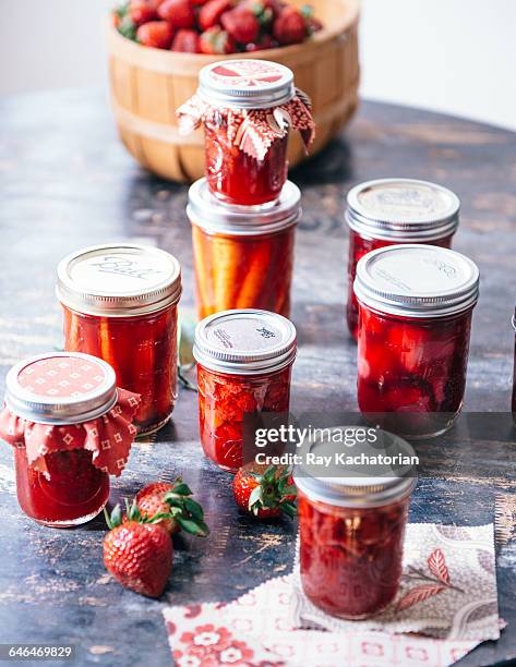 jars of strawberry jam - strawberry jam stock pictures, royalty-free photos & images