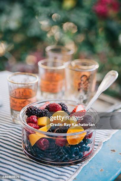 bowl of fruit - fruit salad stock pictures, royalty-free photos & images